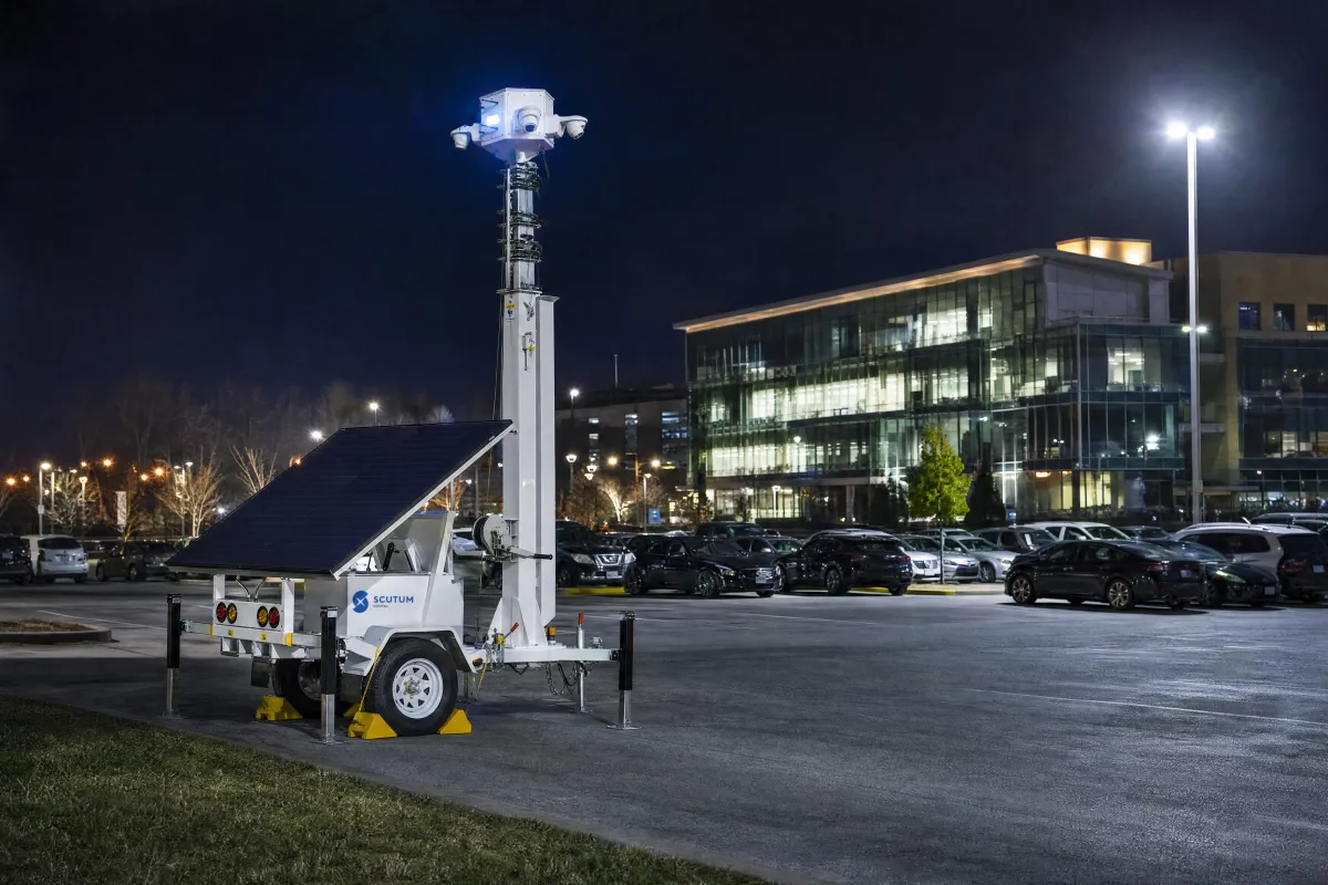 Scutum Digital mobile security tower watching a parking lot full of cars at night